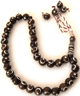 Chapelet "Sebha" marron a 33 gros grains avec motifs argentes - croissant lunaire & etoile