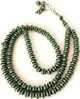 Chapelet "Sebha" Vert Fonce a 99 grains avec decorations argentees
